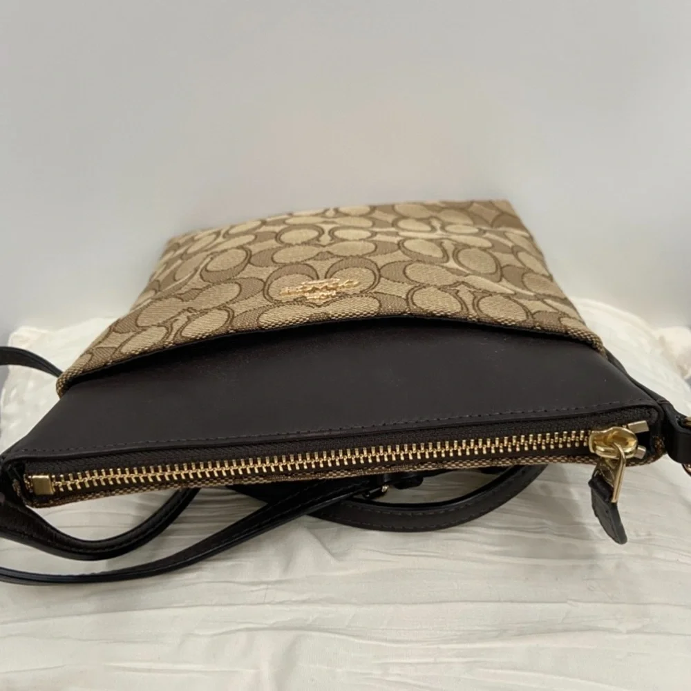 NEW Coach Bag Signature Canvas North South Swing pack 52576‎